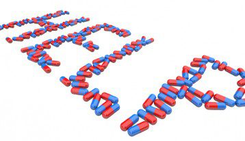 the word help spelled out in blue and red capsules