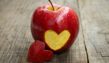 apple with heart cut out of side