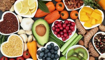 an array of healthy fruits, grains, nuts, and vegetables - nutritional