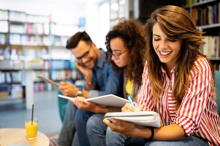 most common reasons teens and young adults turn to drugs or alcohol, group of college students studying together in school library - college students and drugs