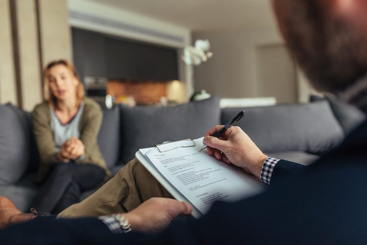 Therapist and client talking to one another