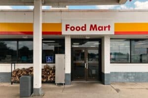 Ranch at Dove Tree - What Is Gas Station Heroin and How Can You Get Help - Edited. Exterior of a gas station with the words food mart written in red letters.